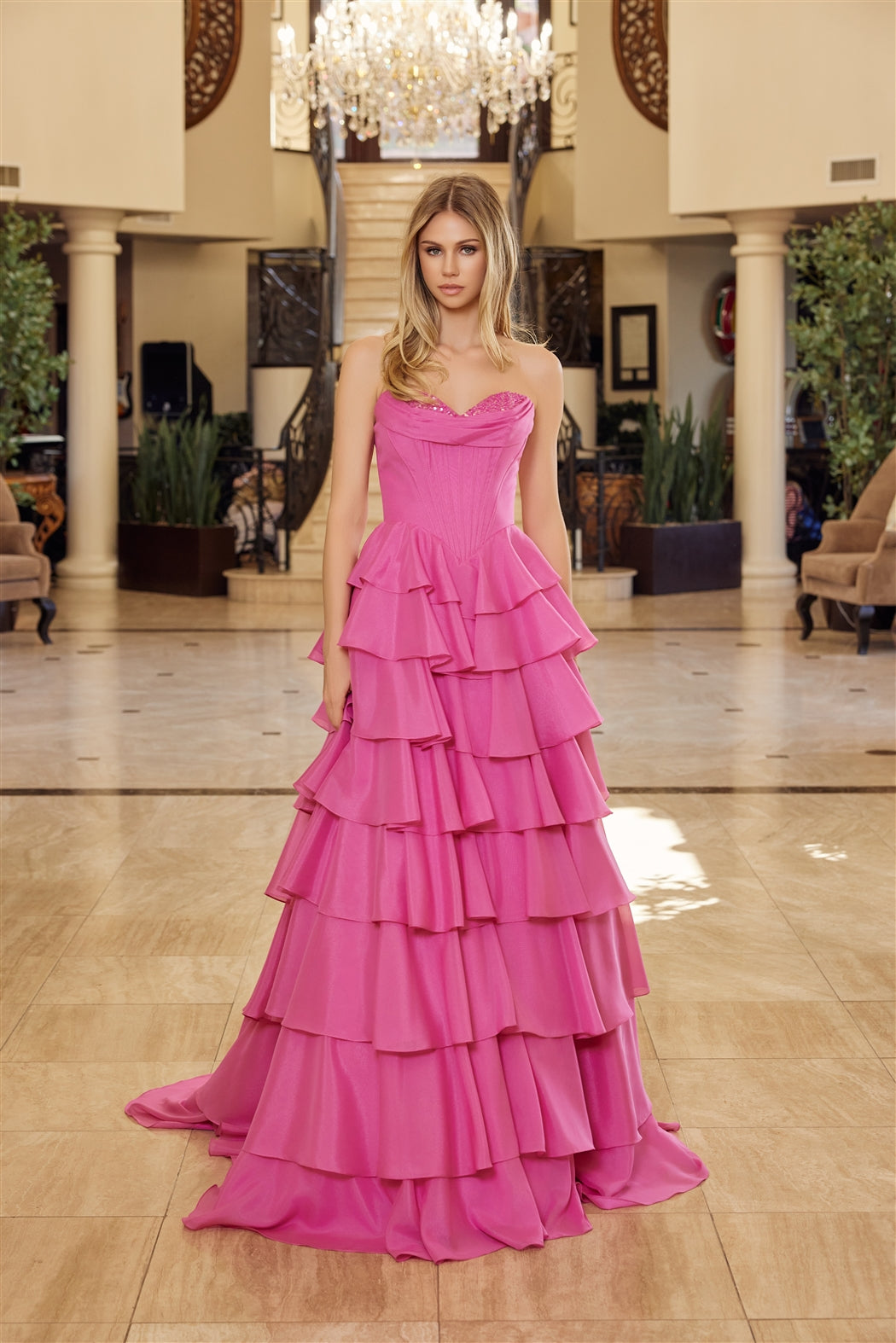 Nox Anabel Audra formal gown featuring a multilayered long ball gown design with sequined bustline and elegant flowing fabric.