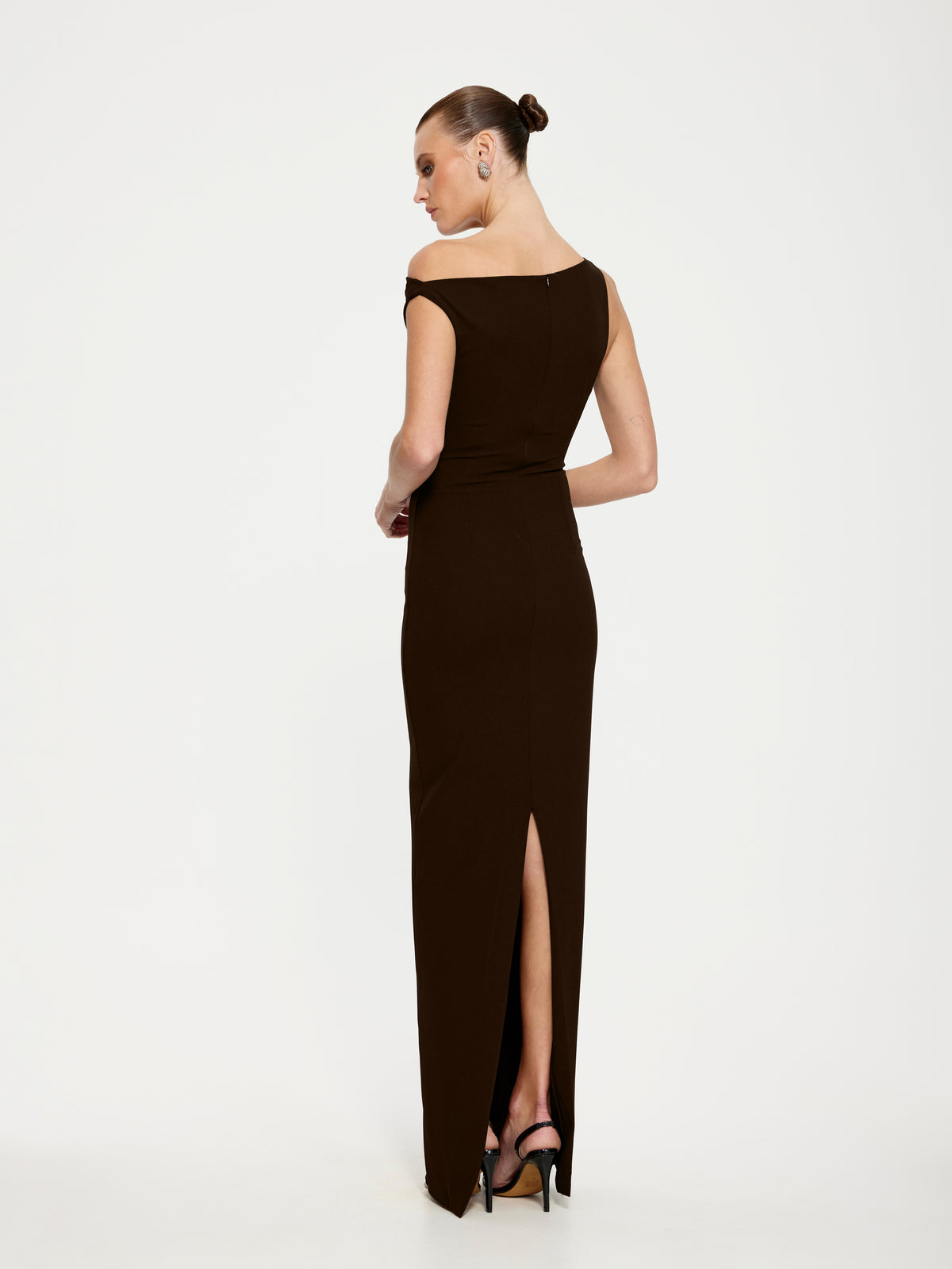 Effie Kats Inaya Gown in coffee color, elegant dress with flowing fabric and intricate detailing, suitable for formal occasions.