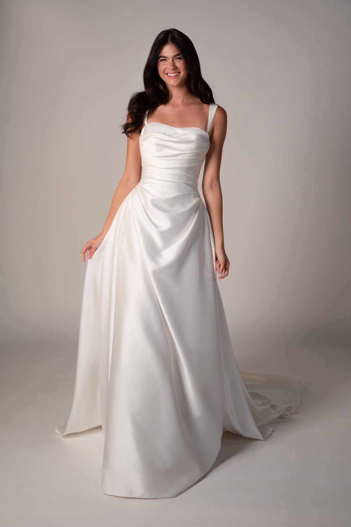 Stella York Marion wedding gown with lace details, fitted silhouette, and elegant train, displayed on a mannequin.