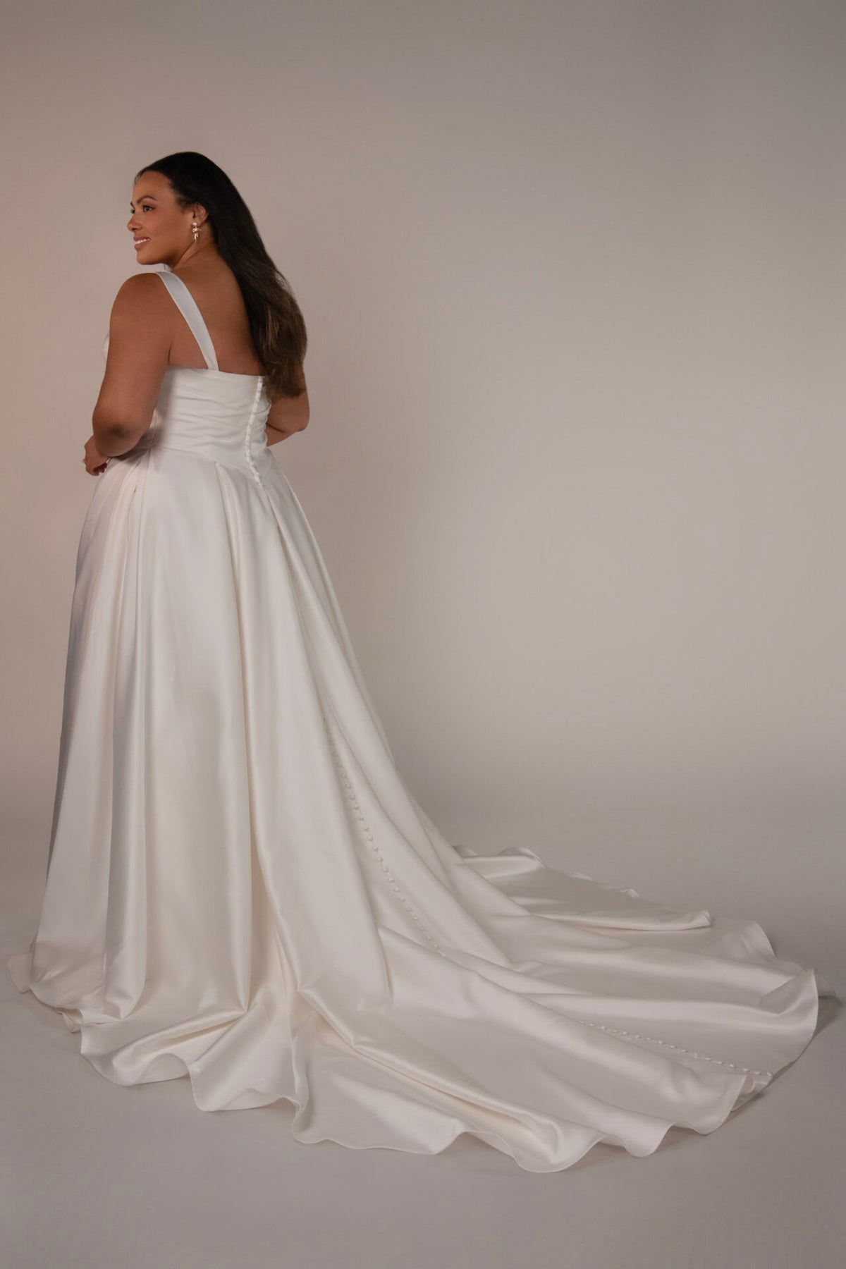 Elegant Stella York wedding gown, Marion style, with intricate lace details and flowing train, arriving in November.