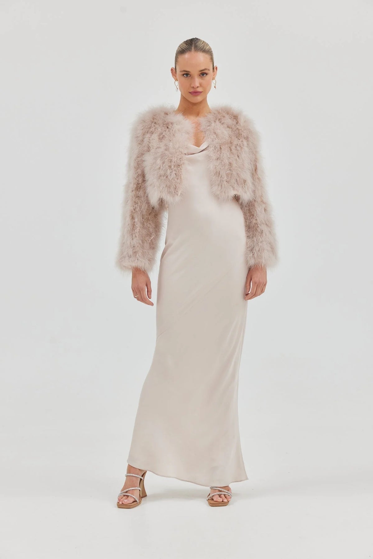 Blush Manhattan Crop Jacket by Bubish, a stylish accessory with a cropped fit and soft fabric, shown in the image.