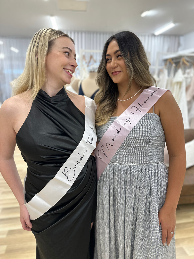 Light pink mother of the bride sash from Honey Fawn Boutique, elegant giftware accessory for wedding celebrations.