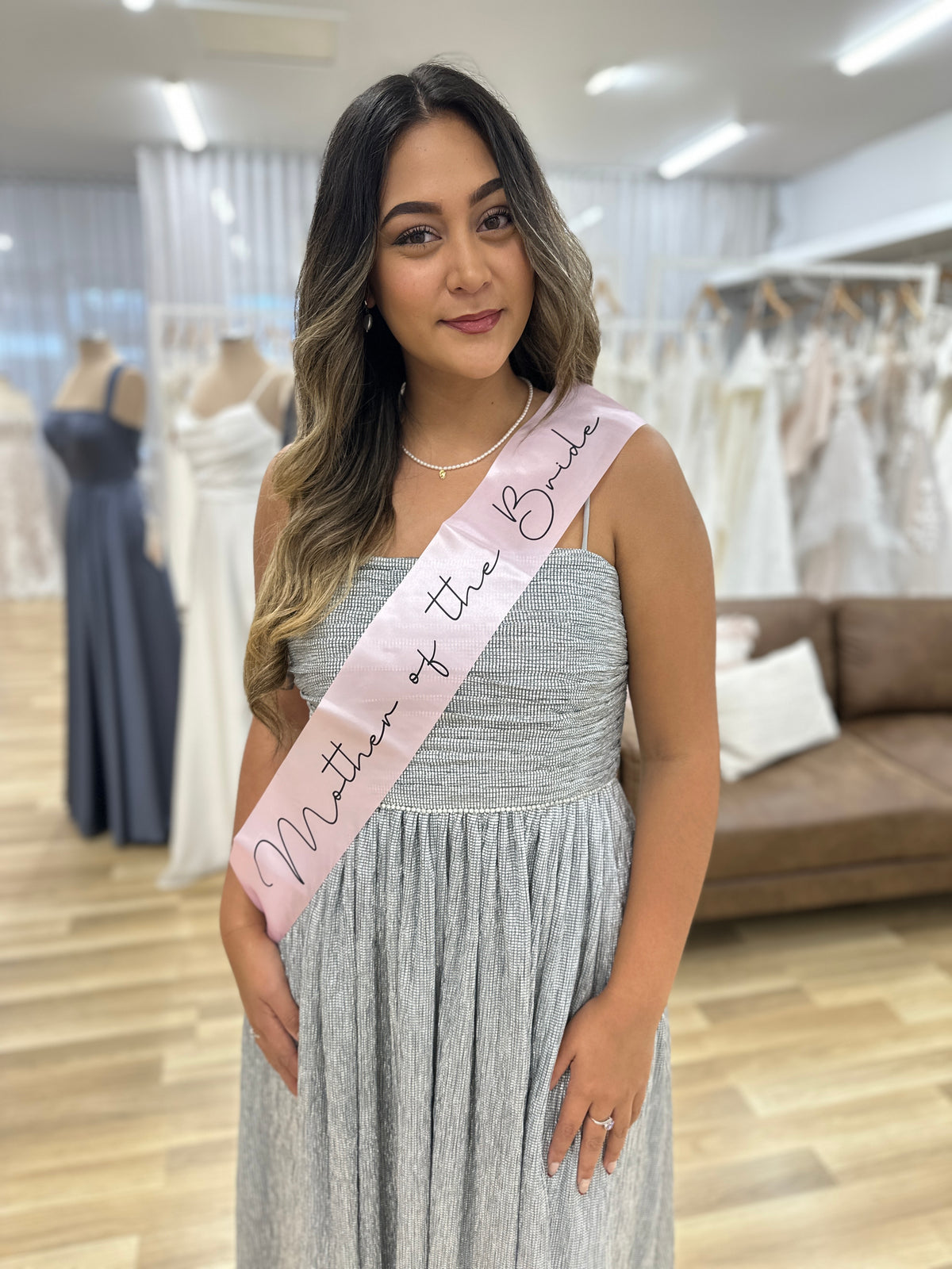 Light pink Mother of the Bride sash from Honey Fawn Boutique, elegant giftware accessory for wedding occasions.